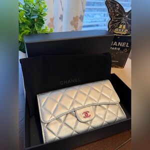 CHANEL Quilted Trifold Wallet with Snap Closure